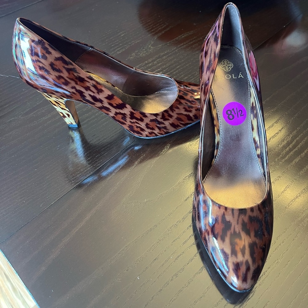 Leopard heel patent pumps. So unique and beautiful. Pristine condition.